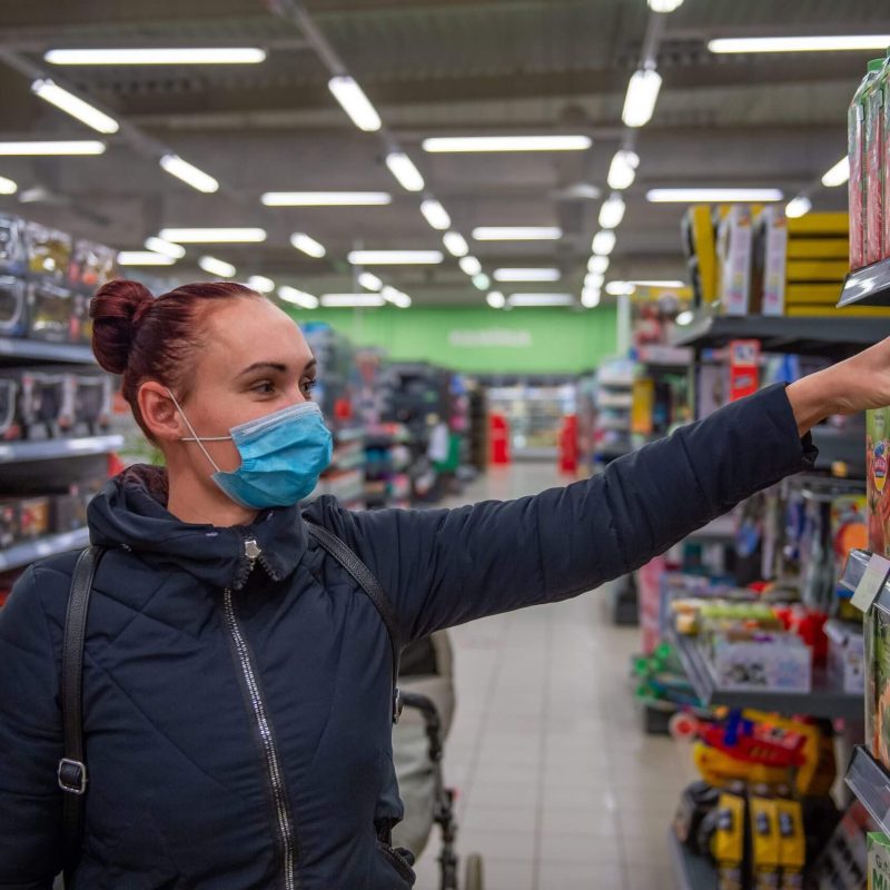 Woman shopping in a grocery store.